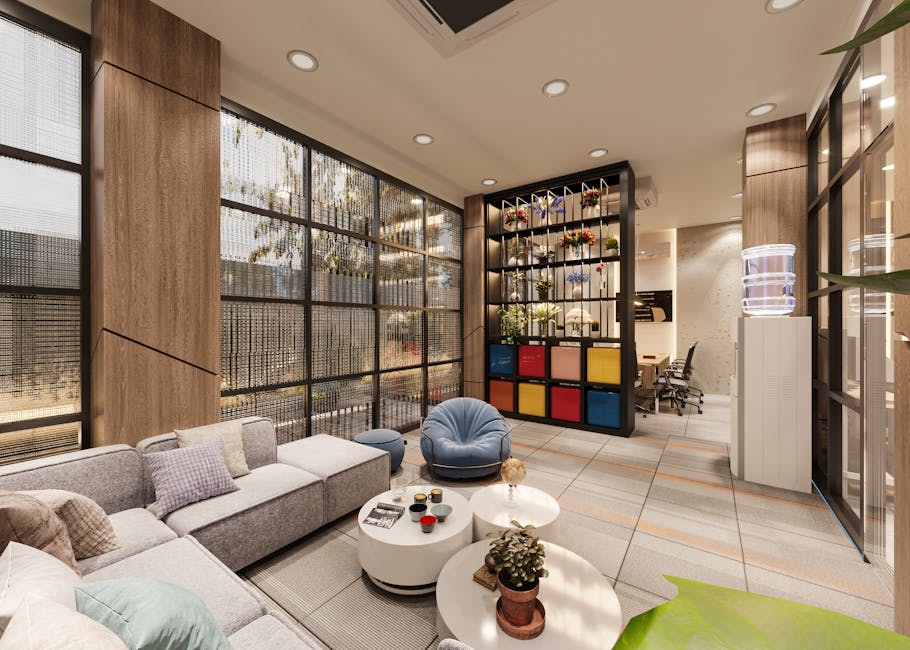 Ugodna uredska lounge zona s modernim namještajem i velikim prozorima